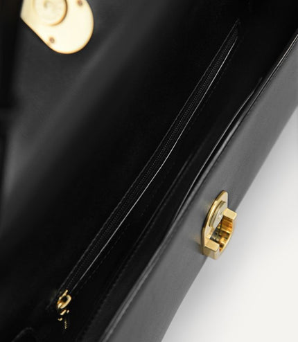Chain Embellished Clutch….