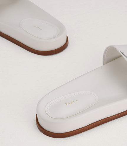 Croc-Effect Buckled Slides
