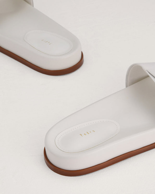 Croc-Effect Buckled Slides