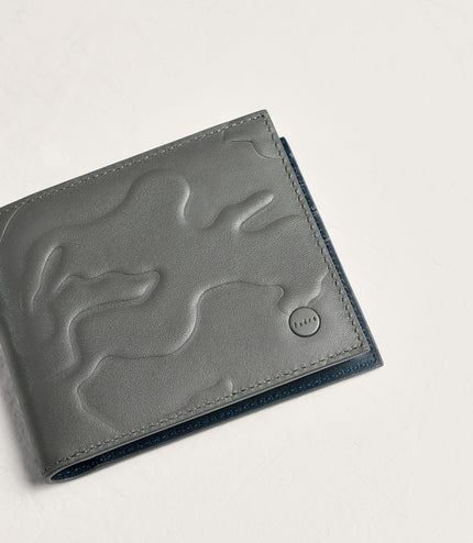 Embossed Leather Bi-Fold Wallet