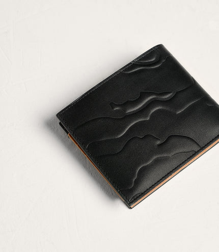 Embossed Leather Bi-Fold Wallet