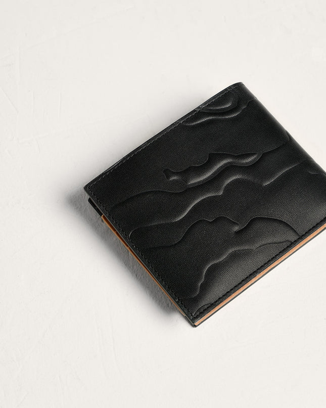 Embossed Leather Bi-Fold Wallet
